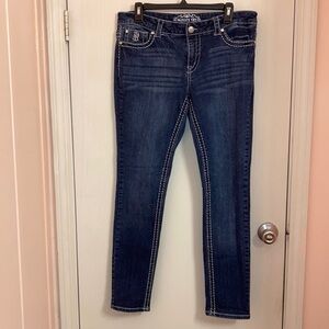 Paisley Sky jeans with silver design and button pockets on the back